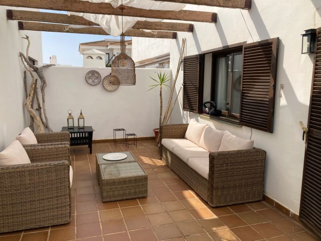 Frontline golf ground-floor apartment with stunning views in La Alcaidesa, near Sotogrande, Cadiz