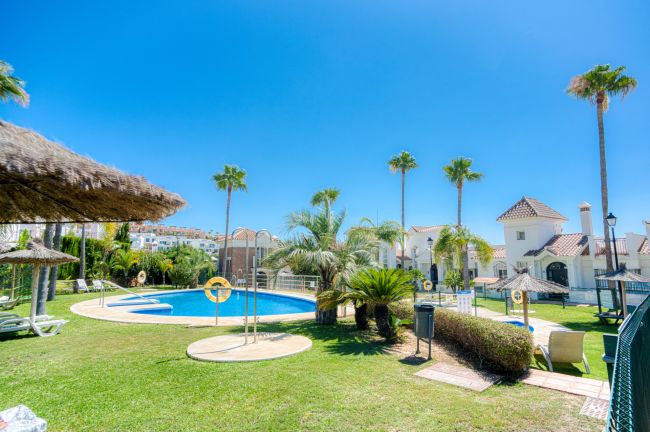 Stylish south east facing, three-bedroom semi detached townhouse located in Riviera del Sol