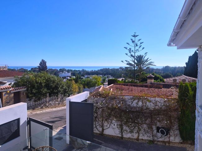A superb modern villa walk to the beach with panoramic views.