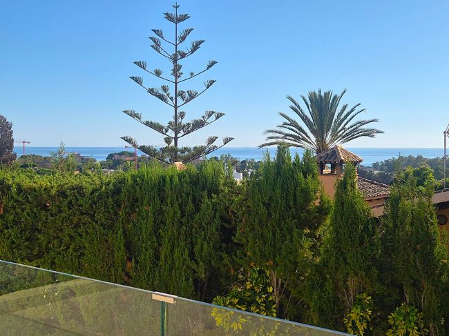 A superb modern villa walk to the beach with panoramic views.