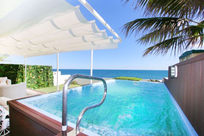 Spectacular Waterfront Duplex with Private Pool & Gardens – Just Steps from the Sea